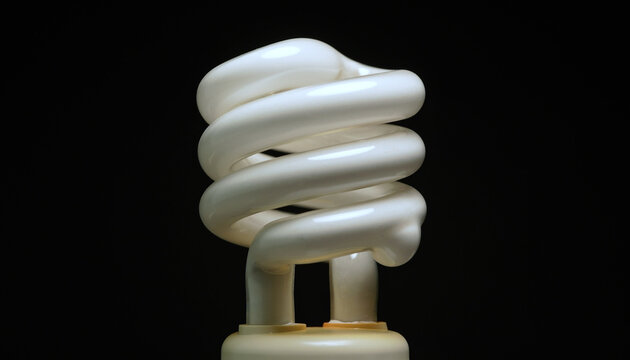 Fluorescent light bulb. Canada&rsquo;s mercury bulb phase-out. Concept image representing environmental regulation, hazardous materials and lighting transition to safer LED bulb alternative use.