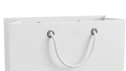 Close-up of a plain white paper shopping bag with white rope handles