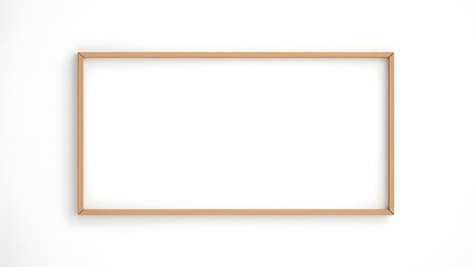 Wooden picture frame on white wall surface