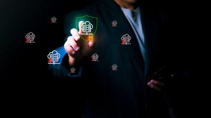 Businessman touching a glowing shield icon to protect cloud server data from malware and cyber attacks. Professional cybersecurity concept for data privacy, network safety, and firewall protection.