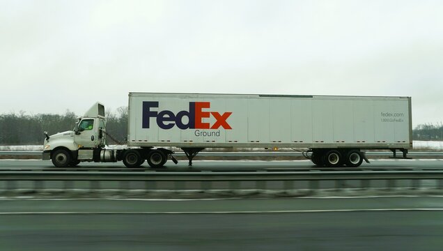 New Jersey, U.S - Jan 17, 2026 - A FedEx Ground truck in motion, showcasing national delivery logistics and branding.