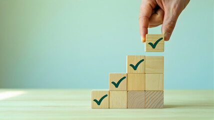 Successful Business Progress and Goal Achievement Hand Placing Final Checkmark Block on a Rising Wooden Staircase, Symbolizing Step-by-Step Task Completion and Milestones