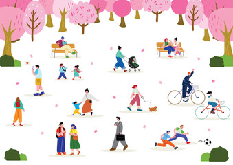 桜の咲く公園で過ごす人々