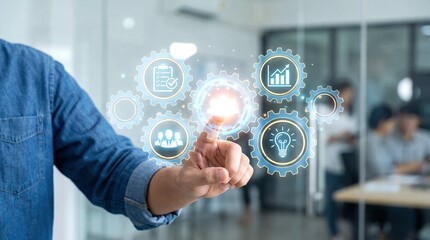 Businessman finger touching digital gear icons representing business strategy, innovation, and growth in office
