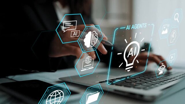 Close-up of a futuristic work environment featuring AI technology concepts, digital icons, and a person hand using a laptop with glowing graphics Gluon.