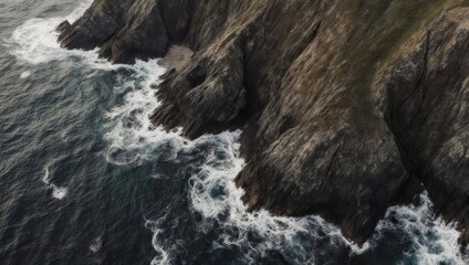 Dramatic coastal cliffs meet churning ocean waves