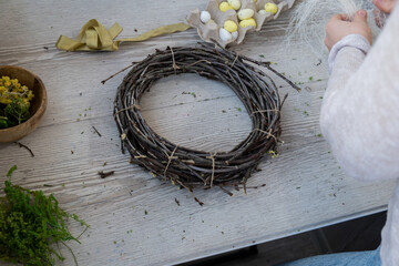 Step by step instruction of making handmade Easter wreath made of sustainable materials decorations...