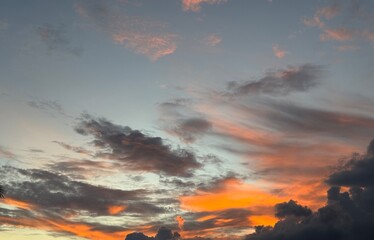 Fototapeta premium Beautiful Sunset Sky with Orange and Blue Clouds