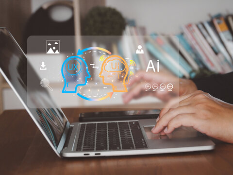 UX UI AI concept with laptop and hands typing showing user experience and interface connection and technology innovation in workspace