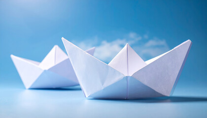 Obraz premium Paper boat origami blue background minimal childhood creativity craft folded paper sailing dream reflection imagination travel summer copyspace water simple floating hobby kids play art abstract