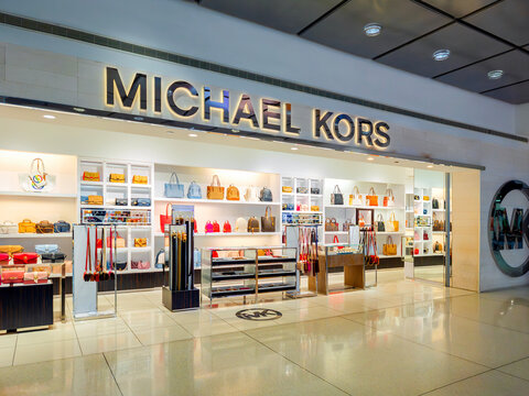 Queens, New York - Feb 6, 2023: Close-up view of Michael Kors Storefront at JFK Airport