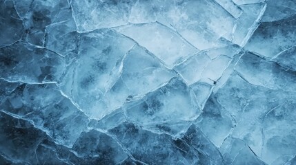 Obraz premium Blue ice background with abstract crack pattern, cold texture for winter theme, abstract design