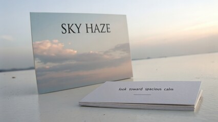 Soft Sky Haze Over Calm Landscape with Inspirational Text on Card, Serenity and Tranquility Concept for Mindfulness