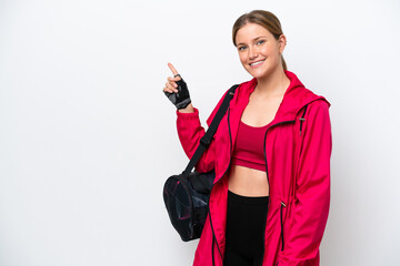 Young caucasian sport woman isolated on white background pointing finger to the side