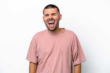 Fototapeta premium Young caucasian man isolated on white background shouting to the front with mouth wide open