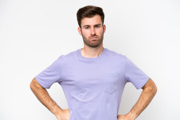 Young caucasian man isolated on white background angry