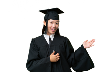 Young university graduate Asian woman over isolated background making guitar gesture