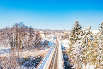 Obraz premium Bridge over Mreznica River in village of Belavici in Croatia in winter