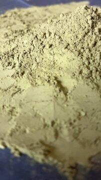 Matcha green tea powder rotation vertical view