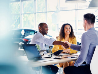 A joyful customer is shaking hands with a representative in an inviting office atmosphere Generative AI