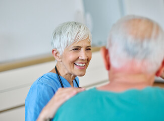 Portrait of a doctor or nurse caregiver supporting senior man, hand on the shoulder care and hug at...