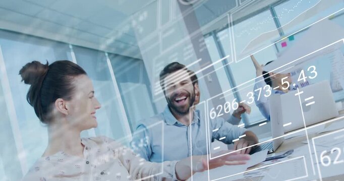 Business colleagues are throwing papers in the air at their office, representing the digital process