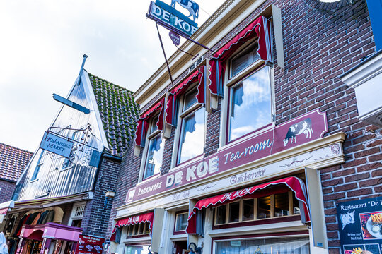 De Koe tea room restaurant in Volendam Netherlands. Old house street wall building architecture. Volendam, Netherlands - October 27, 2025