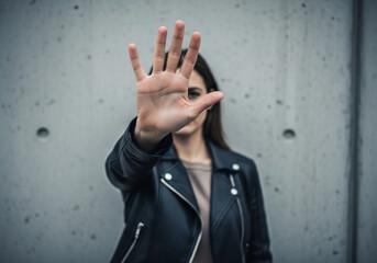 Concept of Protection and Denial with Female Figure Holding Hand Up