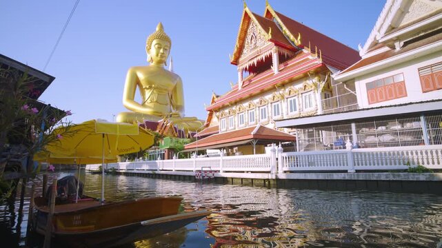 Big Golden Buddha Dhammakaya Tep Mongkol Buddha at Wat Paknam Bhasicharoen temple sightseeing travel in Bangkok Thailand 