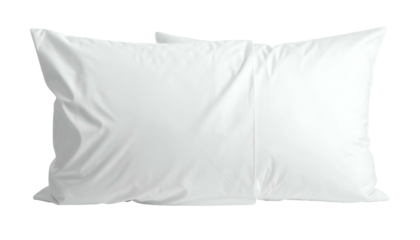 Two white rectangular pillows, angled slightly, isolated against a solid black background