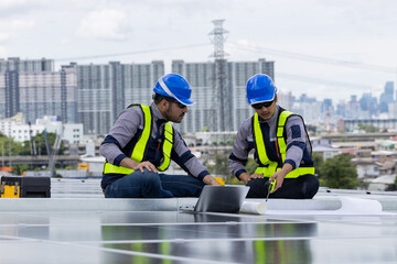 Fototapeta premium Engineers analyzing rooftop solar panel system data