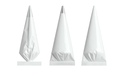 Three white icing bags, two full, one partially filled, against a black background