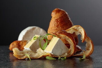 Camembert cream cheese croissants and rosemary.