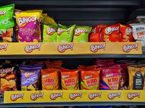 Shelves filled with bingo chips from ITC showing the various pack colors and flavors that the tobacco and FMCG player provides in the market