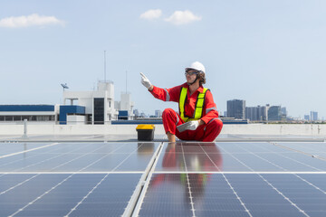 Engineers analyzing rooftop solar panel system data