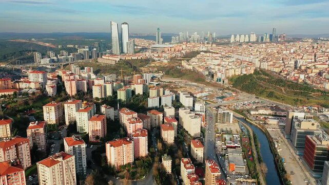 Istanbul Kagithane aerial view featuring modern office plazas and business centers. Cinematic drone flight over the urban valley.
