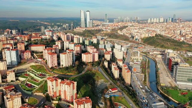 Istanbul Kagithane aerial view featuring modern office plazas and business centers. Cinematic drone flight over the urban valley.