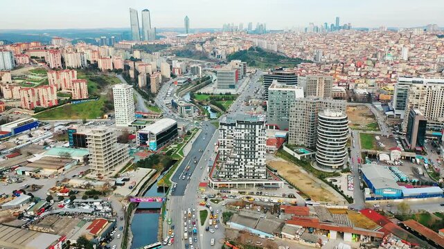 Istanbul Kagithane aerial view of Cendere Street with modern buildings and heavy traffic. Cinematic drone flight over the business valley district.