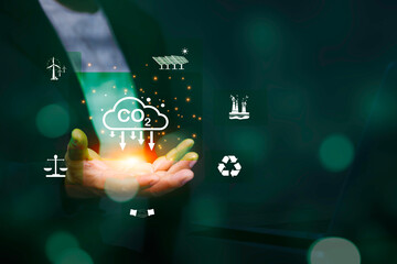 ESG sustainability and carbon reduction concept with CO2 emissions control, renewable energy and environmental responsibility.