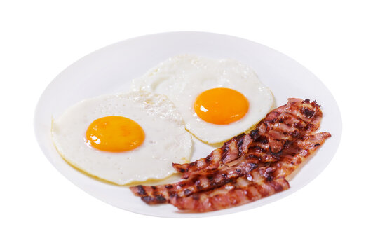 plate of fried eggs and bacon isolated on transparent background