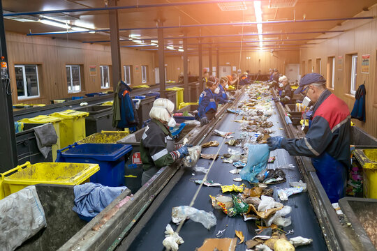 Conveyor for sorting garbage waste by people. Garbage processing?