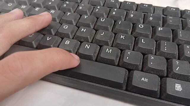 Pressing the space bar on the keyboard with your index finger