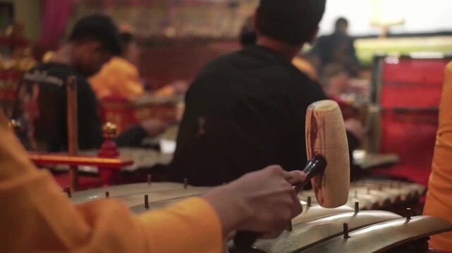 Traditional Javanese Gamelan Orchestra Performing at Night Ceremony