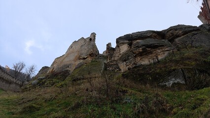 Medieval castle ruins in Czech countryside during autumn weather