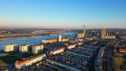 tunning Drone Photography of Nijmegen Skyline Featuring the De Oversteek Bridge and River Waal