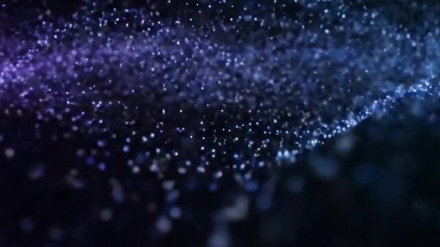 Ethereal Particle Drift Slow, undulating movement of glowing dust-like particles against a deep, dark background.