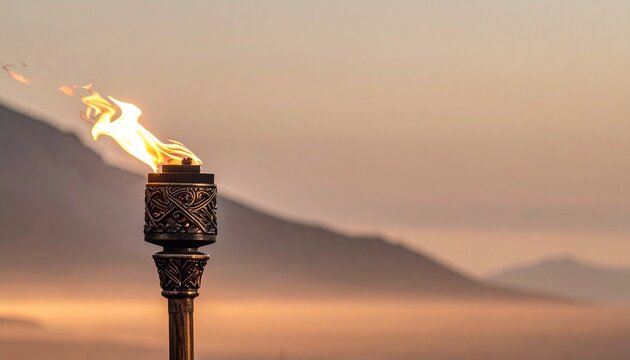 Single Viking Torch with Bright Orange Flame at Dusk Inspired by the Traditional Up Helly Aa Celebration
