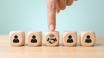 Hand choosing partnership connection concept on wooden blocks