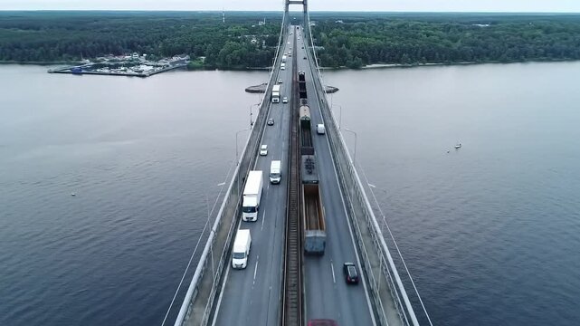 A long Train going from naigoan to bhayandar on vasai creek bridge bird eye view
