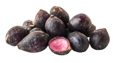 Fresh acai berries with one cut open showing pink interior Isolated on White background